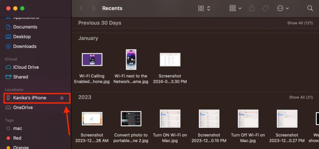 Select your iPhone from the Finder sidebar