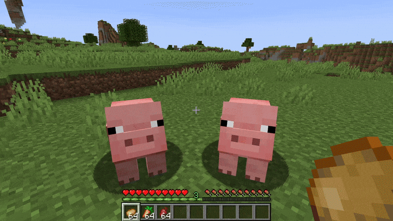 Player breeding pigs using their favorite foods in Minecraft