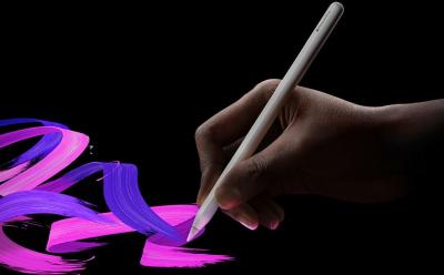 Apple Pencil Pro in hand drawing on compatible iPad