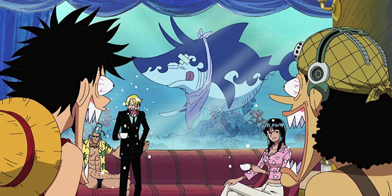 Luffy and his crew surprised by the shark in a fish tank.