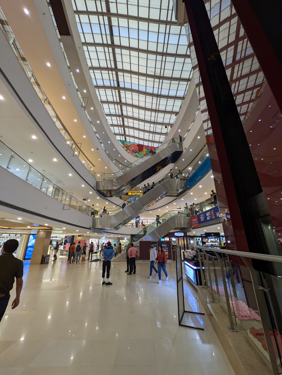 Pixel 8a ultrawide angle shot of inside a mall