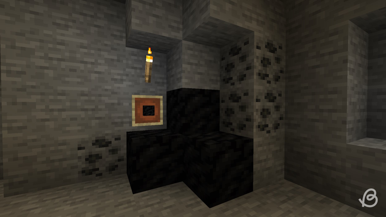 Coal block fuel source in a cave in Minecraft
