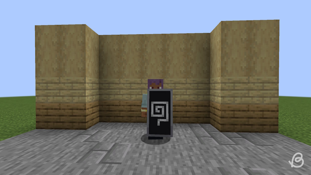 Player holding a cool shield, which is an item you should bring to trial chambers in Minecraft 1.21
