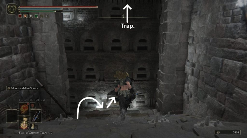 Trigger the final trap in this hall, and move to the arch. Take the lift to the next section of the dungeon.