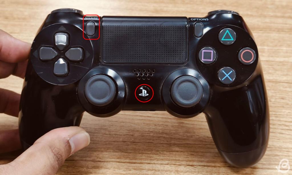 Share and Home buttons on PS4