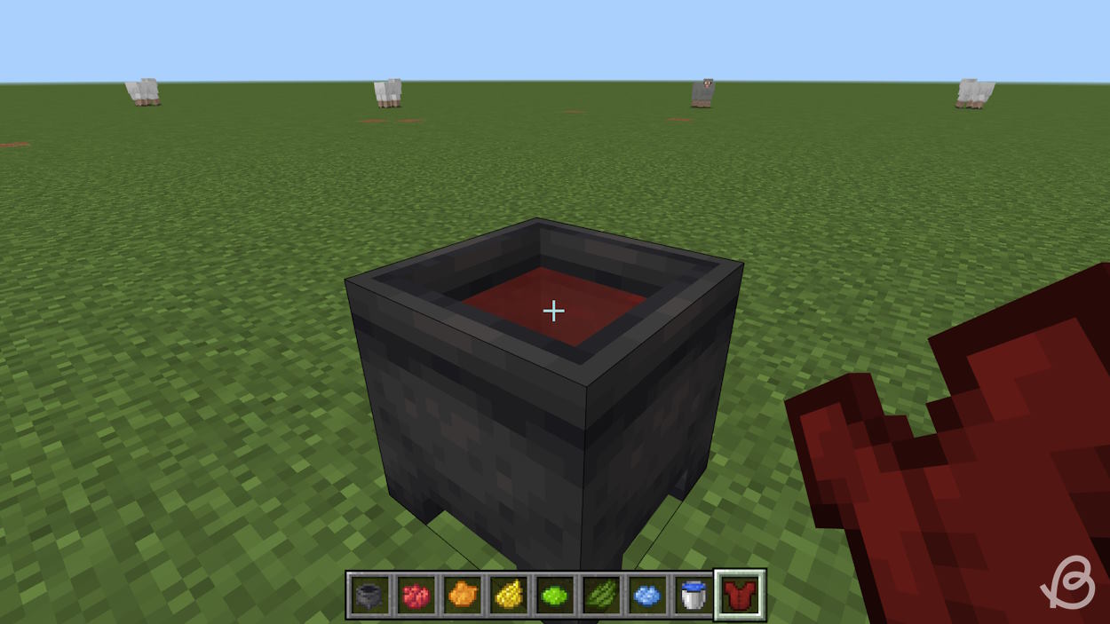 Dying leather armor using a cauldron with colored water on Bedrock edition