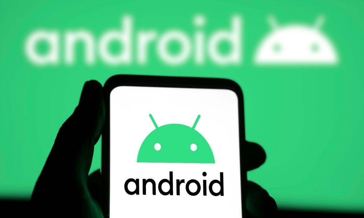 Android logo on a phone in front of a green background