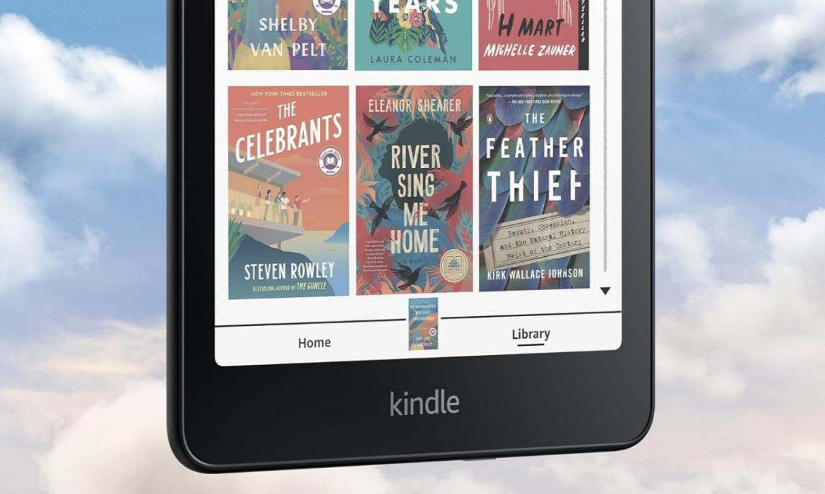 Amazon Kindle Colorsoft in front of a sky and cloud backdrop