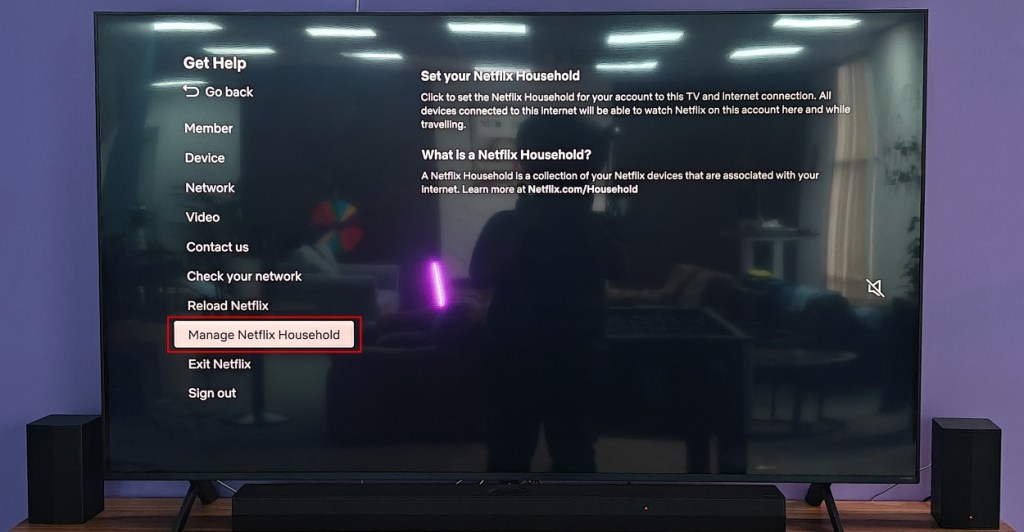 TV showing Netflix Get Help screenwith Manage Netflix Household option highlighted