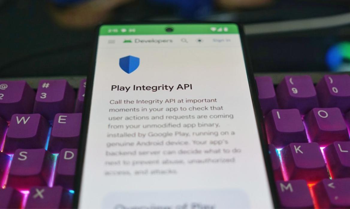 Image of Google Play Integrity web page with keyboard at the background