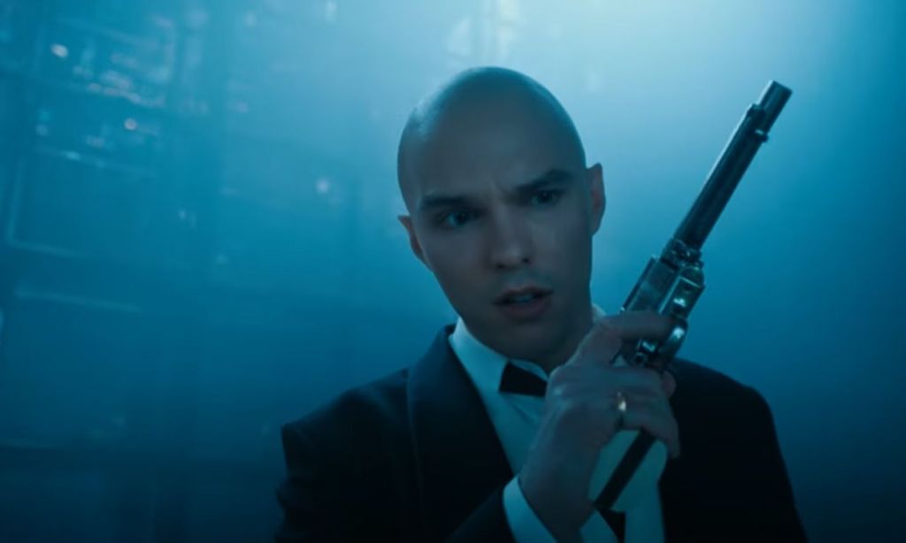 Lex Luthor holding a gun