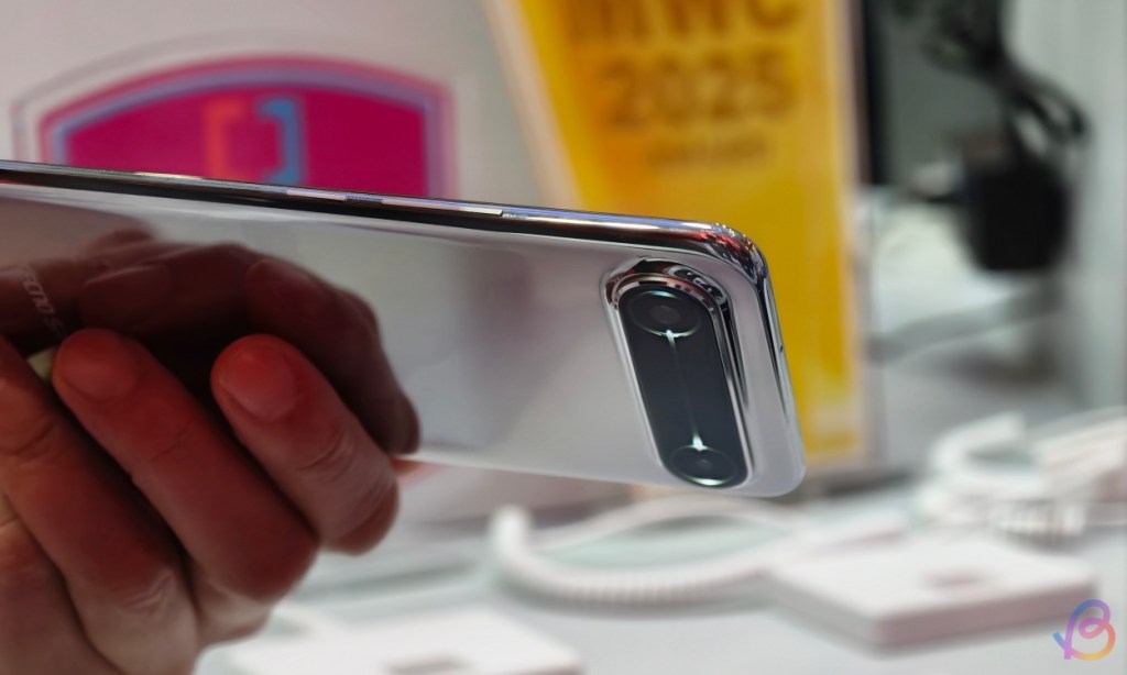 shot of hand holding a Tecno Spark Slim at MWC 2025