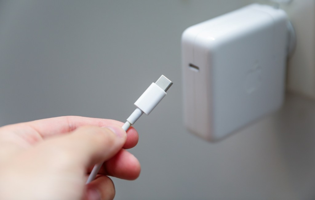 USB Type C Power Delivery Cable held in front of the adapter